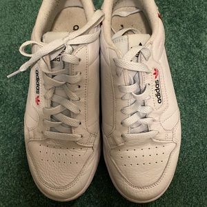 Blue tint Adidas white continentals